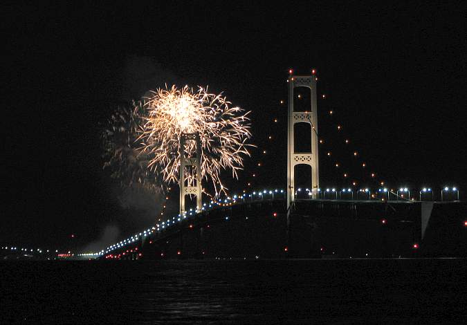 Mackinac Bridge at night with fireworks