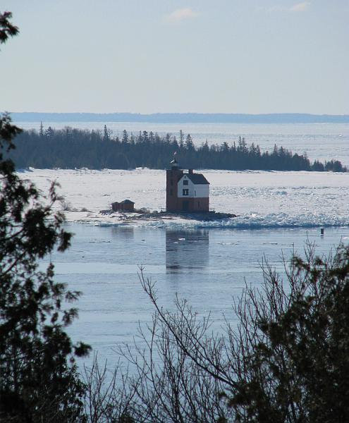 Round Island Lighthouse with ice and snow - Michigan Great Lakes