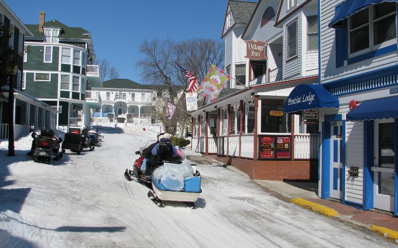 Snowmobiling on Mackinac Island streets