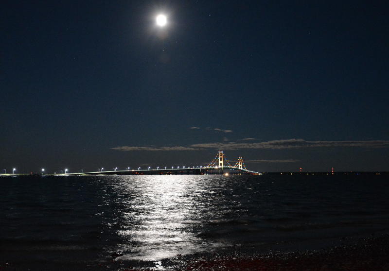Mackinac Bridge and the moon at night