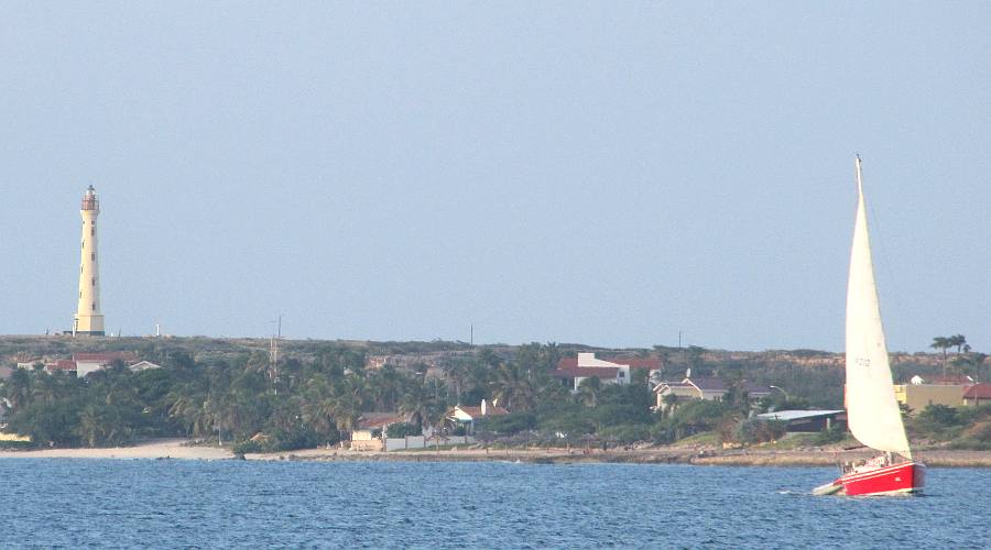 California Lighthouse and sailboat - Aruba