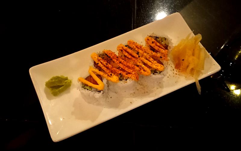 Spicy salmon roll - Three's Bar and Grill