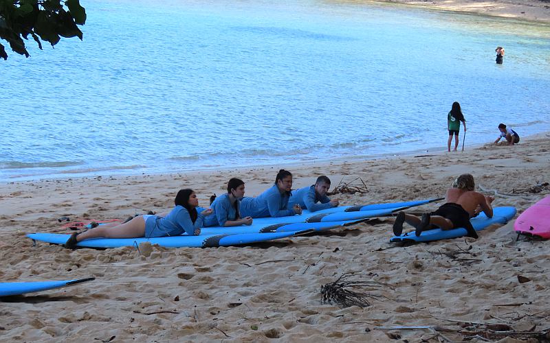 Surfing lesson at Kawela Bay