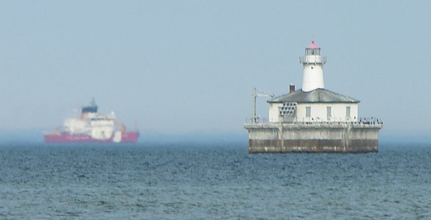 Coast Guard Cutter Mackinaw near Fourteen Foot Shoal Light